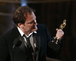 Director Quentin Tarantino accepts the award for best original screenplay for "Django Unchained" at the 85th Academy Awards in Hollywood